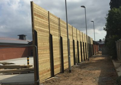 Tall wooden commercial fencing