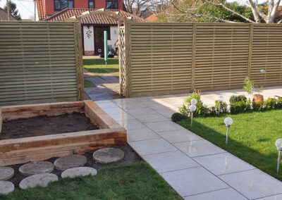 New wooden fencing and landscaped garden
